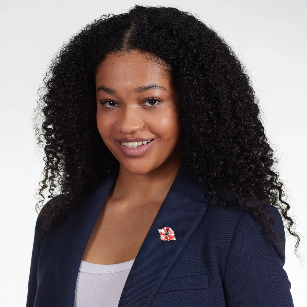 Model wearing Black Fire Opal Poppy Brooch